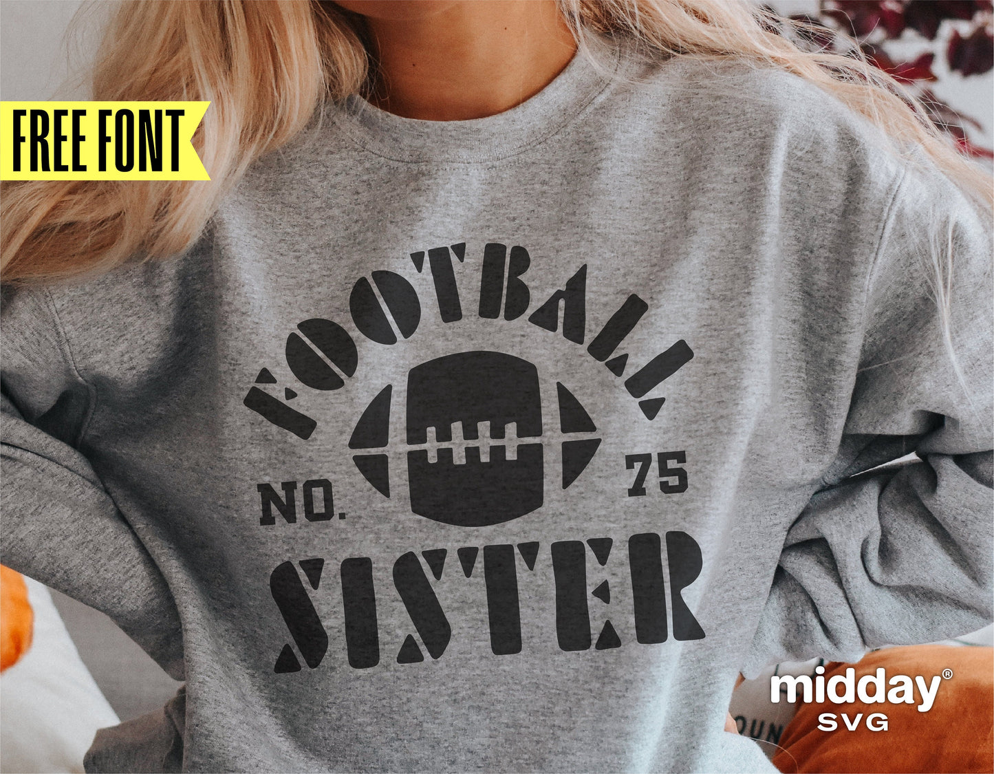 Woman wearing a gray sweatshirt with 'Football Sister' graphic design, featuring a football and the number 75. Ideal for Cricut and Silhouette projects.