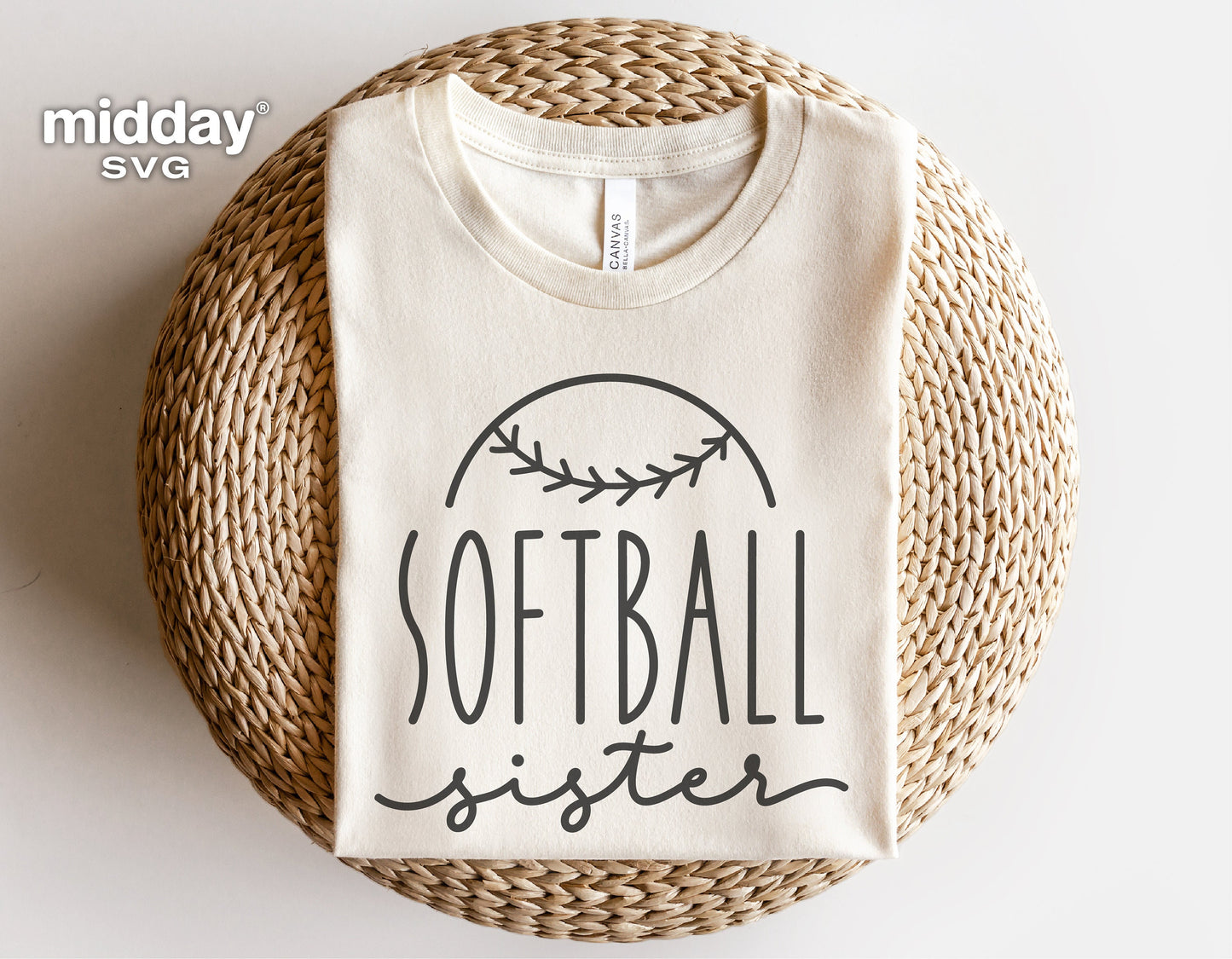 Softball Sister shirt design in SVG format on folded white t-shirt, ideal for Cricut and Silhouette cutting machines.