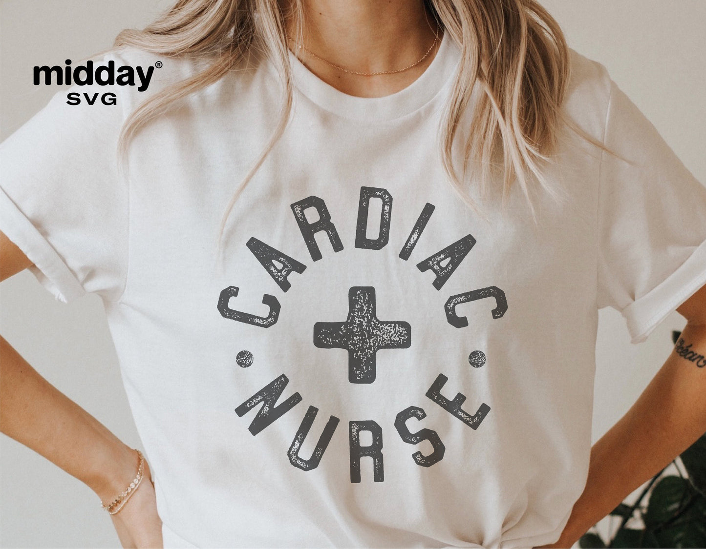 Woman wearing a Cardiac Nurse t-shirt with a medical cross graphic, designed for healthcare professionals, suitable for Cricut and Silhouette.