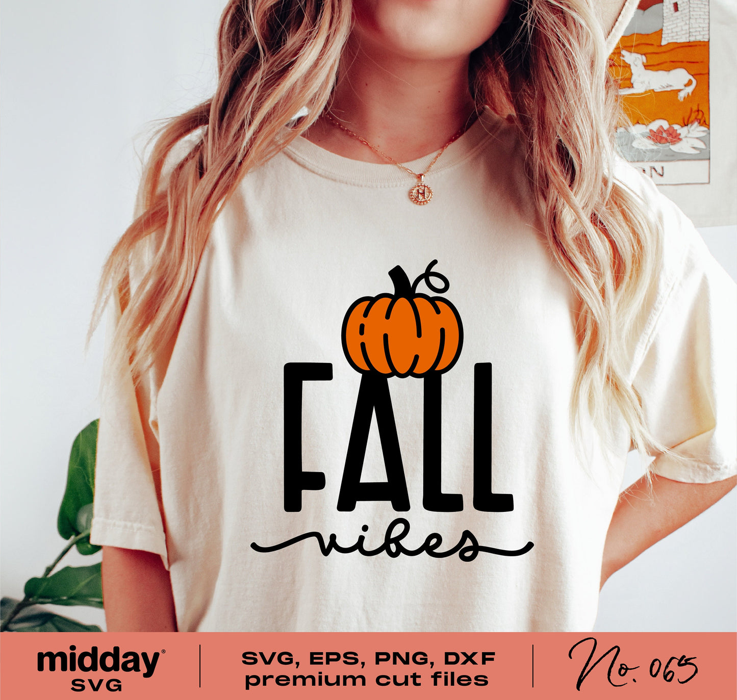 Woman wearing a Fall Vibes shirt featuring a pumpkin design, available in SVG, EPS, PNG, and DXF formats for Cricut and Silhouette.