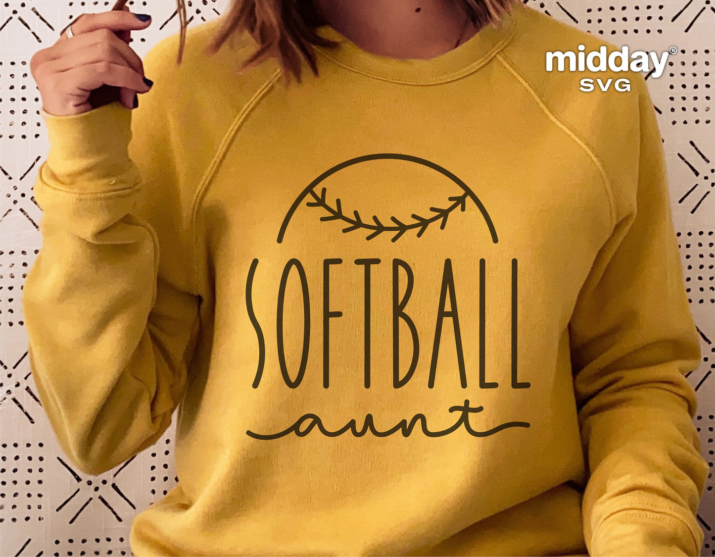 Woman wearing yellow sweatshirt with 'Softball Aunt' design, perfect for SVG, Cricut, and Silhouette projects.