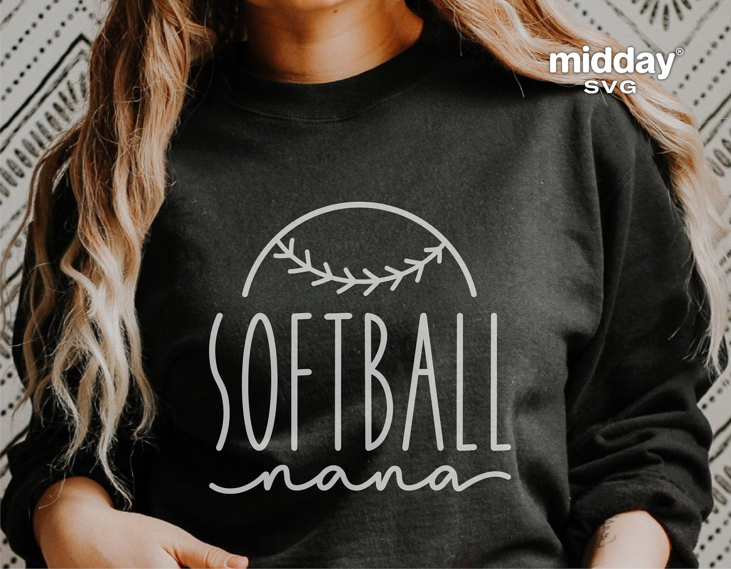 Woman wearing black sweatshirt with 'Softball Nana' design, ideal for Cricut and Silhouette crafts, perfect gift for softball grandmothers.