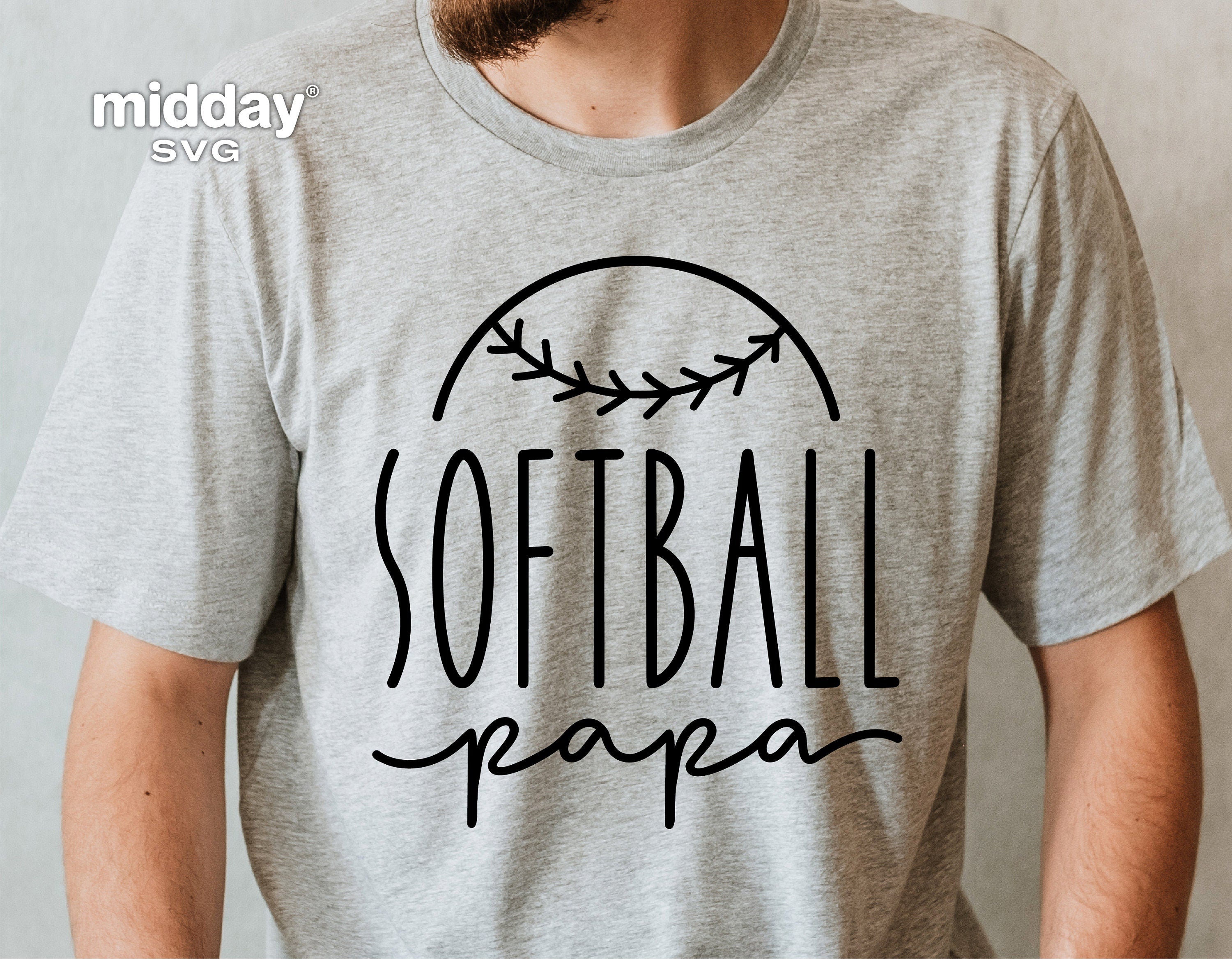 Gray t-shirt featuring 'Softball Papa' design with baseball stitching, ideal for Cricut or Silhouette projects.