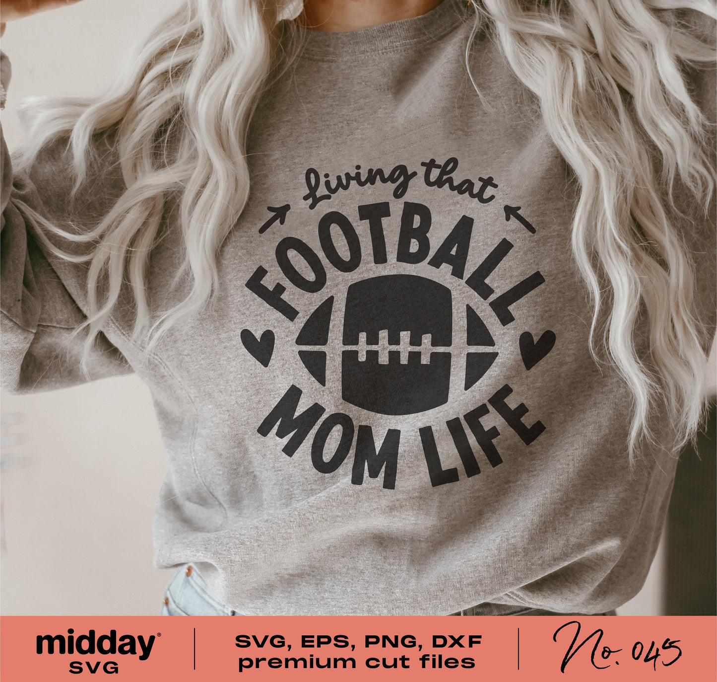 Woman wearing 'Living that Football Mom Life' graphic shirt, ideal for Cricut and Silhouette, includes SVG, EPS, PNG, DXF files.