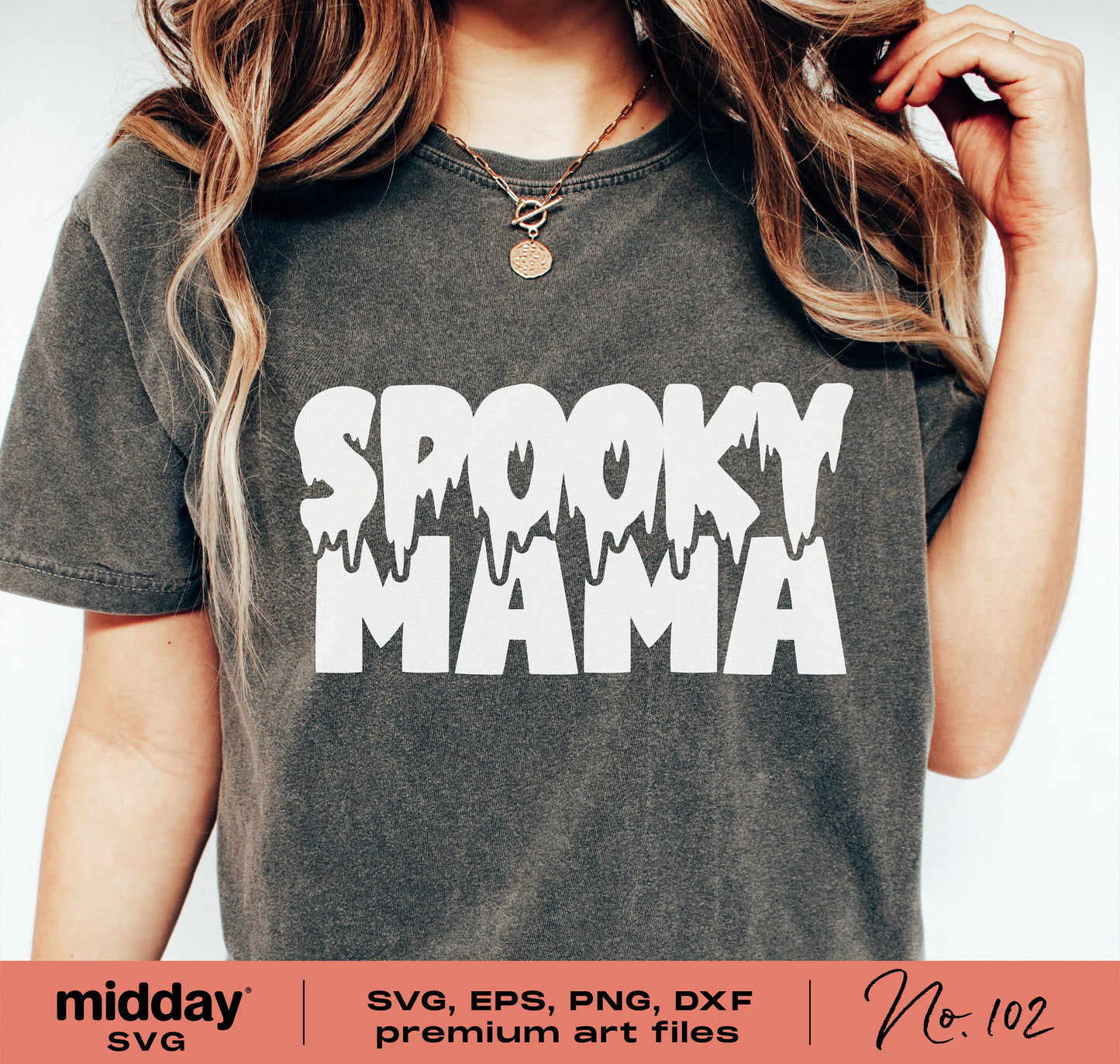 Woman wearing a Spooky Mama shirt with dripping white text, ideal for Halloween. Available in SVG, PNG, DXF formats for Cricut projects.