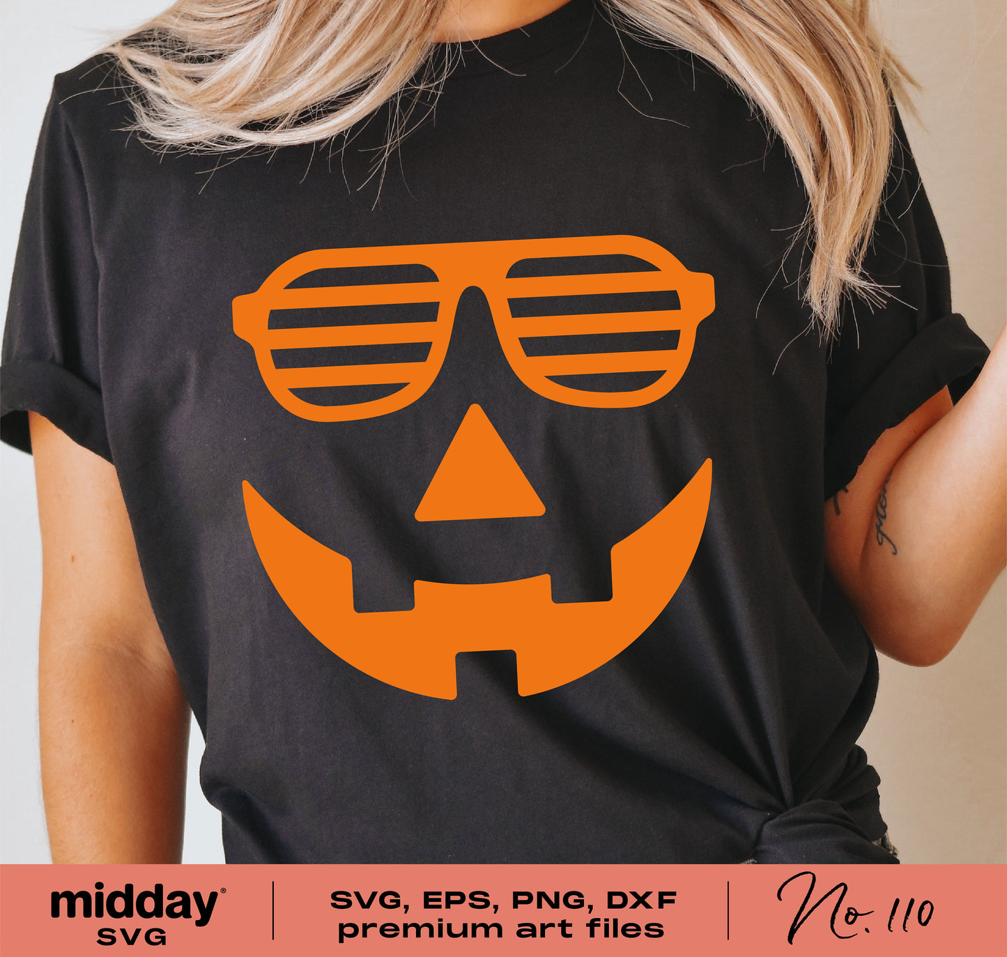 Black t-shirt featuring a funny pumpkin face design with sunglasses, ideal for Halloween crafting with SVG, PNG, DXF, EPS cut files.