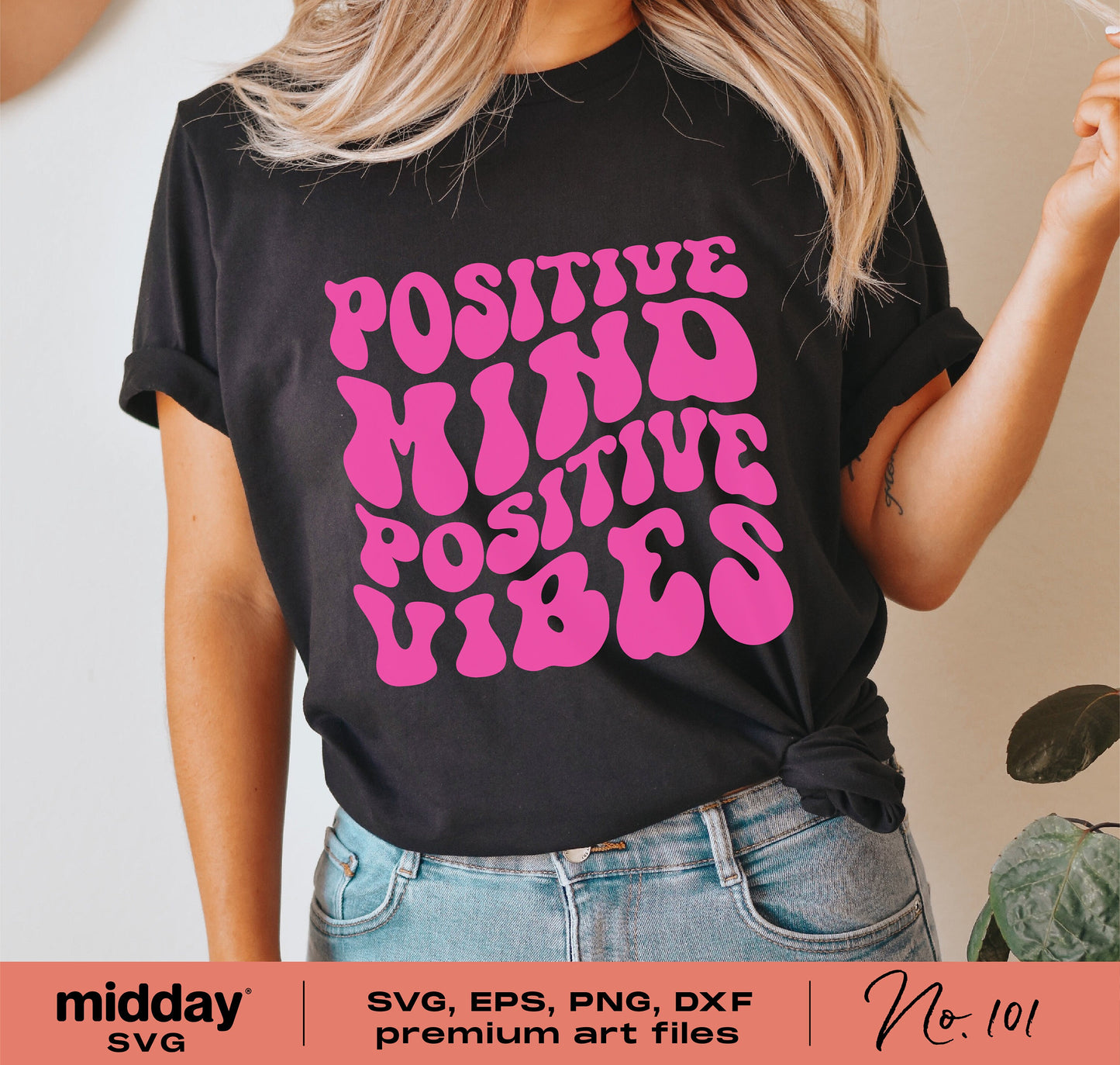 Woman wearing black t-shirt with 'Positive Mind Positive Vibes' pink retro print, promoting mental health and inspirational SVG files.