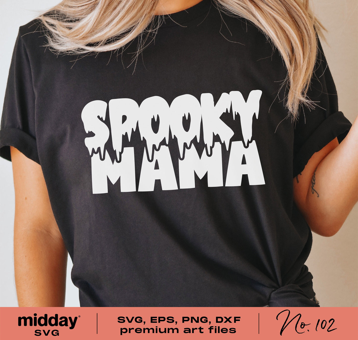 Woman wearing black t-shirt with 'Spooky Mama' text; perfect Halloween gift for stylish moms; ideal for Cricut crafting.