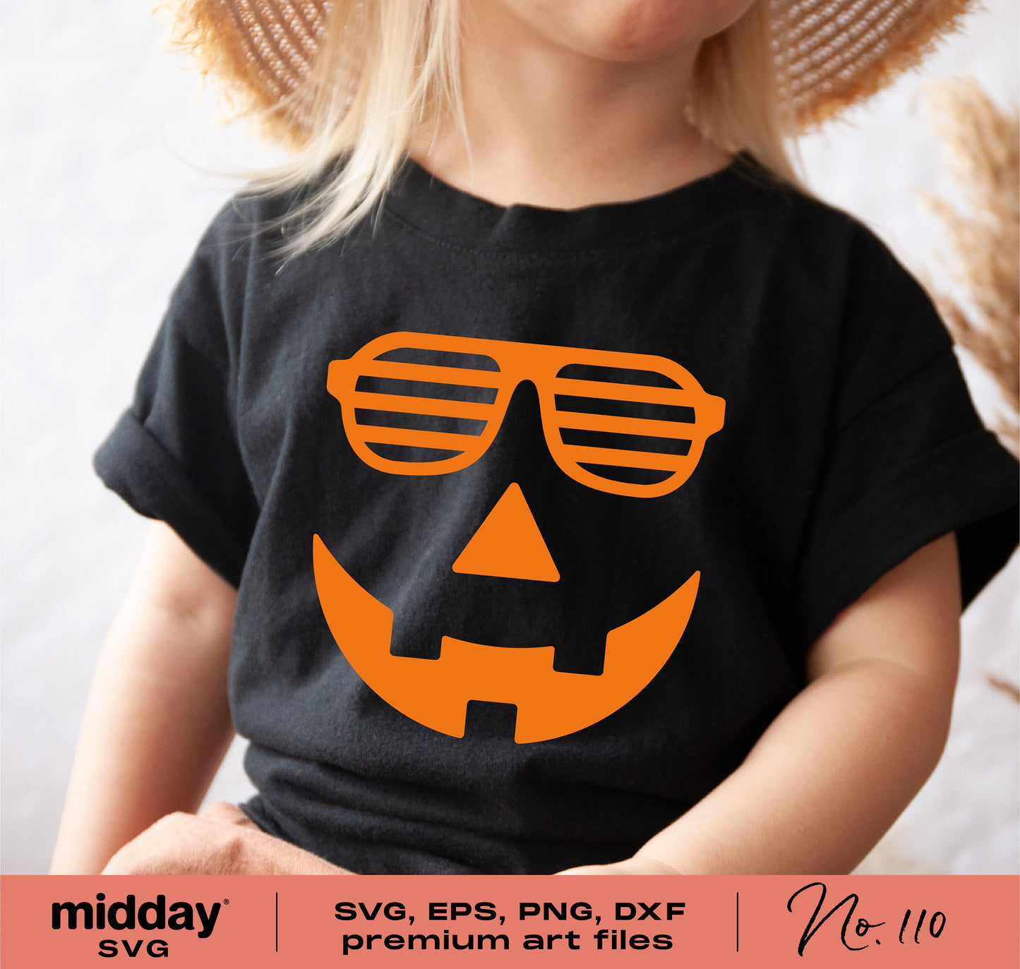 Child wearing black shirt with cool pumpkin face design in orange, ideal for Halloween trick or treat and crafting with Cricut or Silhouette.