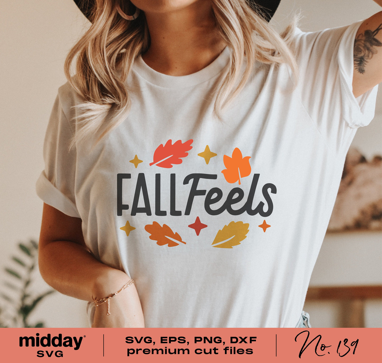 Woman wearing a white shirt with 'Fall Feels' print, featuring autumn leaves and stars in orange, yellow and red. Perfect for Cricut or Silhouette.