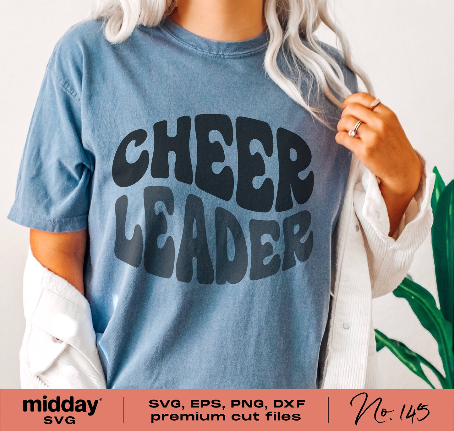 Woman wearing a retro style blue t-shirt with 'Cheer Leader' text, ideal for SVG, EPS, PNG, DXF cut file projects, No. 145 design.