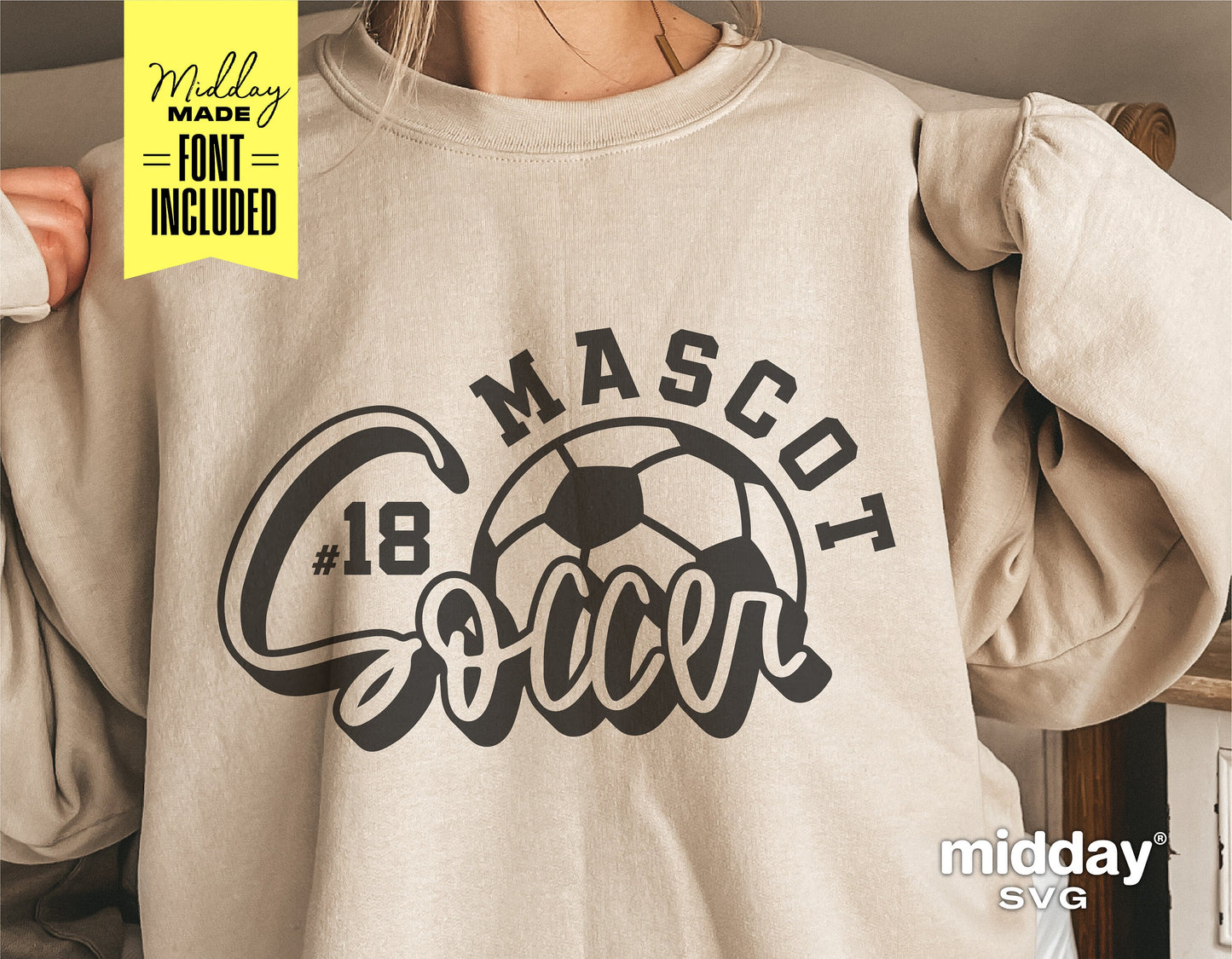 Beige sweatshirt featuring 'Mascot Soccer' design with a soccer ball graphic, ideal for team apparel or soccer fans.