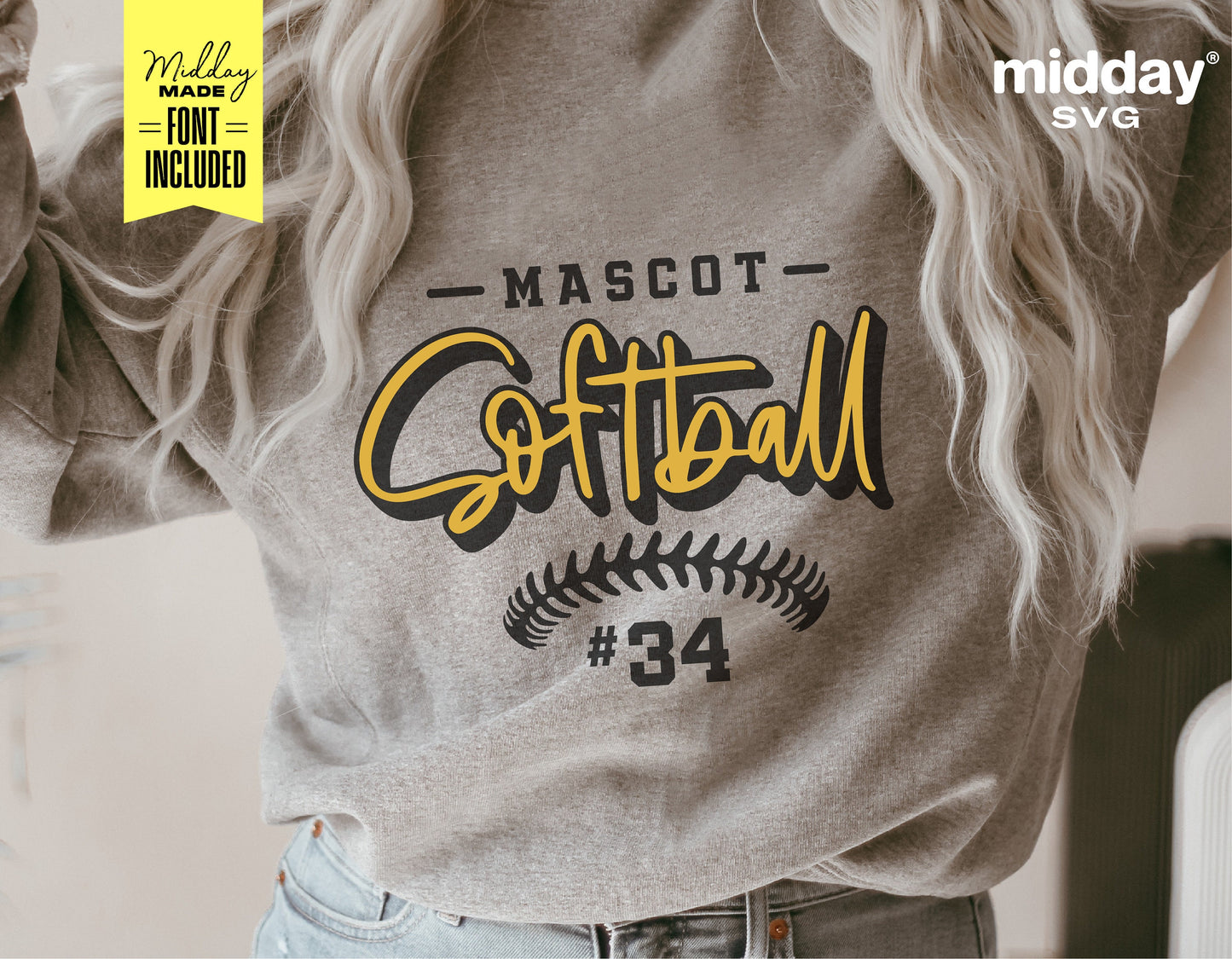 Woman wearing sweatshirt with customized softball team logo showing 'Mascot Softball #34' design in yellow and black.