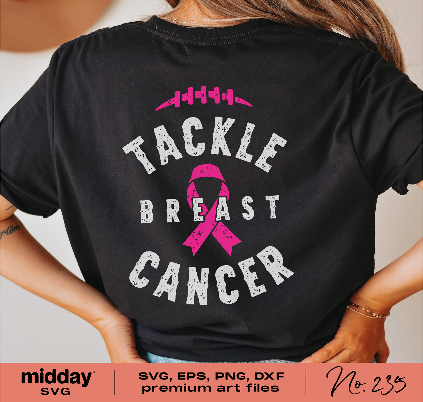Black T-shirt with pink ribbon design reading 'Tackle Breast Cancer' for breast cancer awareness.