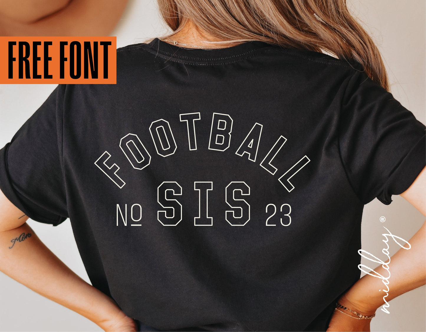 Back view of a black t-shirt featuring a Football Sister design with the text 'Football Sis No 23' and a free font offer.