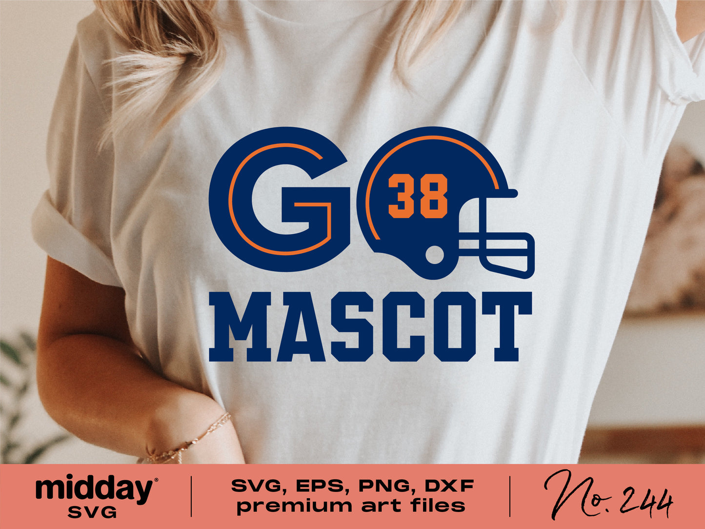 Person wearing a t-shirt with a blue and orange football helmet design, featuring the number 38 and the word 'Mascot', ideal for Cricut or DIY projects.