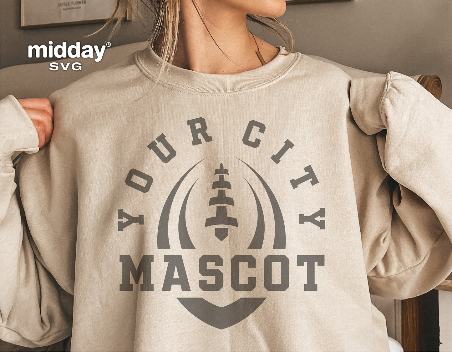 Woman wearing a 'Your City Mascot' football team shirt, showcasing custom sports apparel ideal for Cricut and Silhouette crafting.