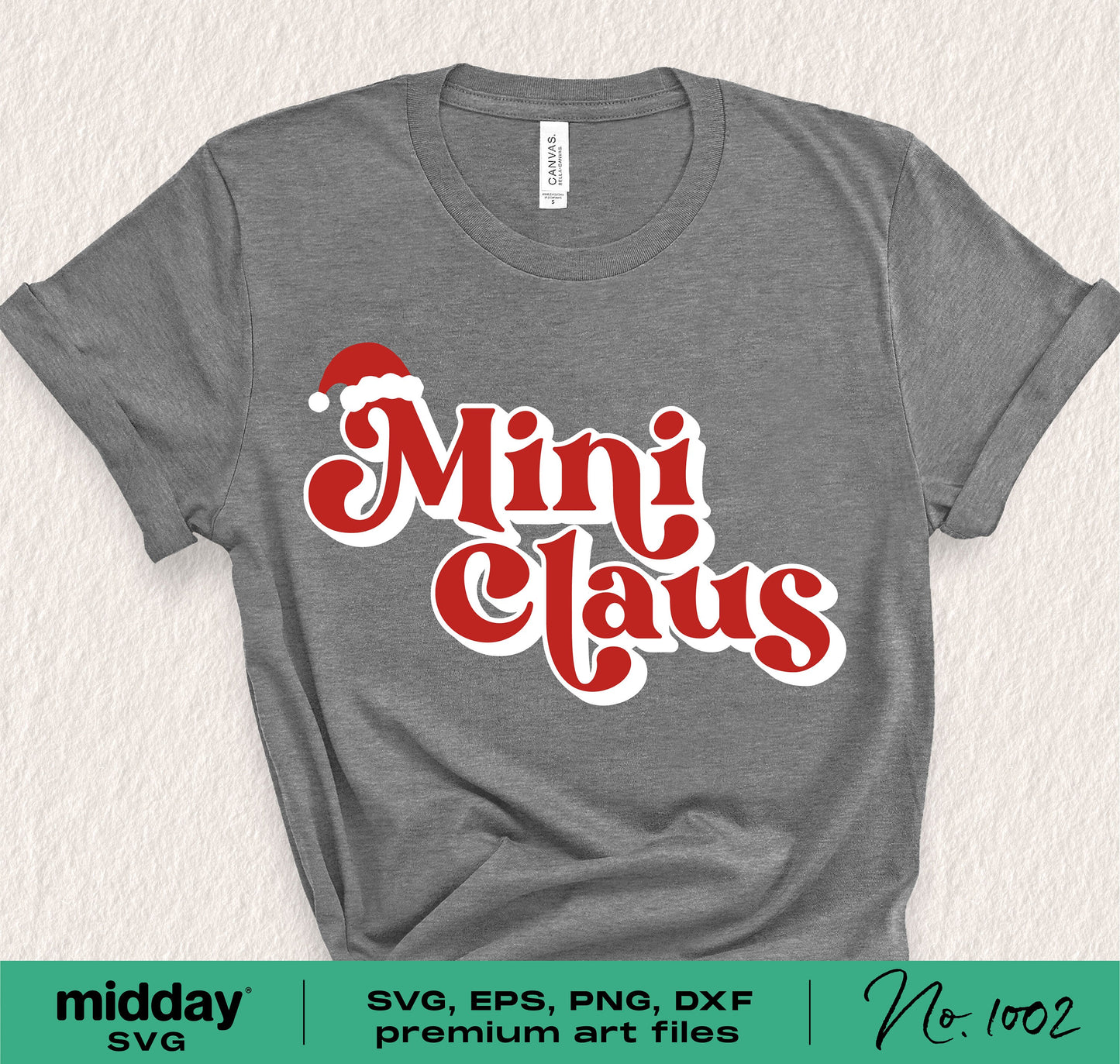 Gray Christmas t-shirt for kids with 'Mini Claus' in red, includes SVG, PNG, DXF, and EPS formats for Cricut and Silhouette.