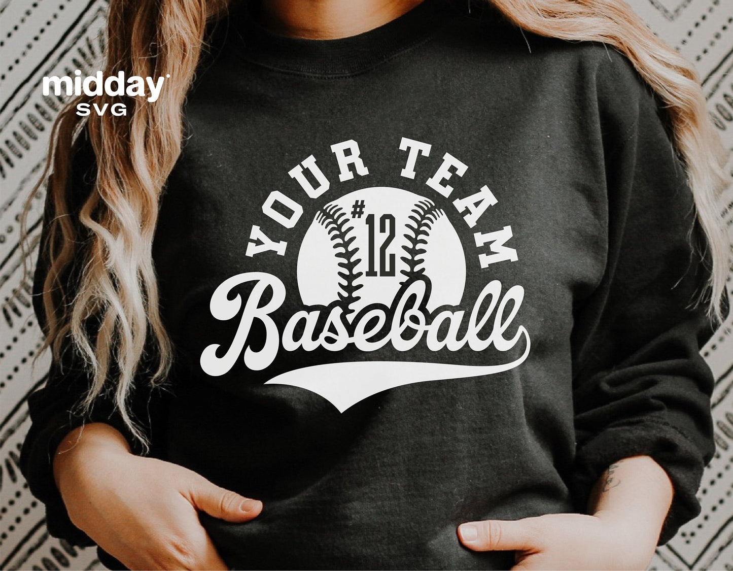 Woman wearing a black shirt with a customizable baseball team logo design in white.