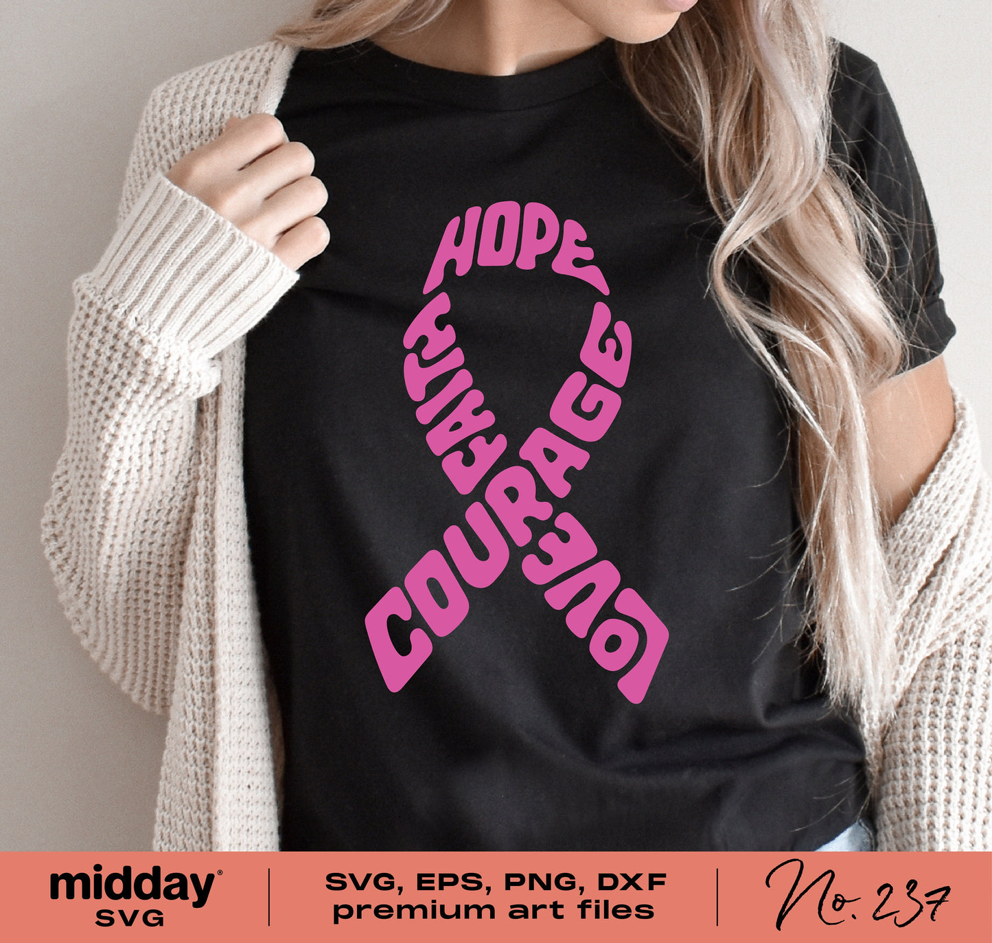 Woman wearing a black t-shirt with pink breast cancer awareness ribbon featuring words 'Hope Faith Courage Love'