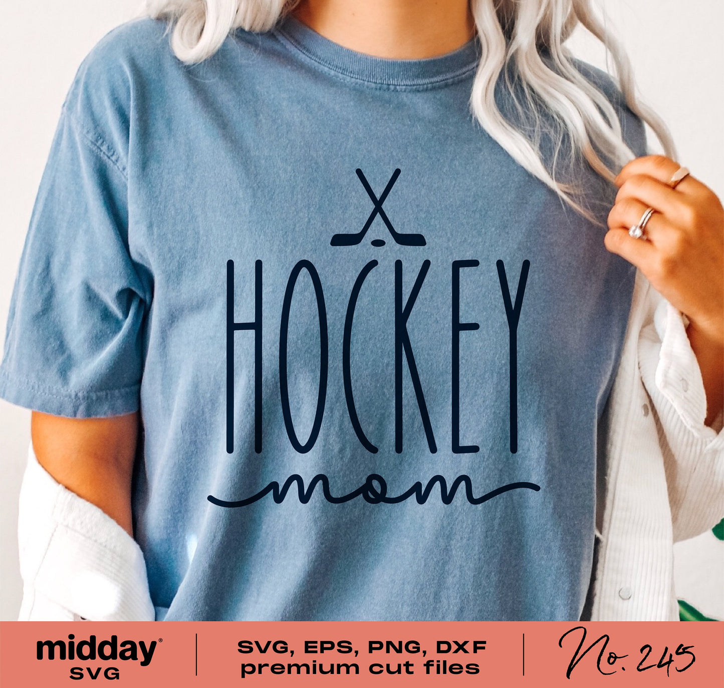 "Hockey Mom" t-shirt design featuring vintage style text and crossed hockey sticks, available in SVG, PNG, DXF, and EPS formats for crafting.