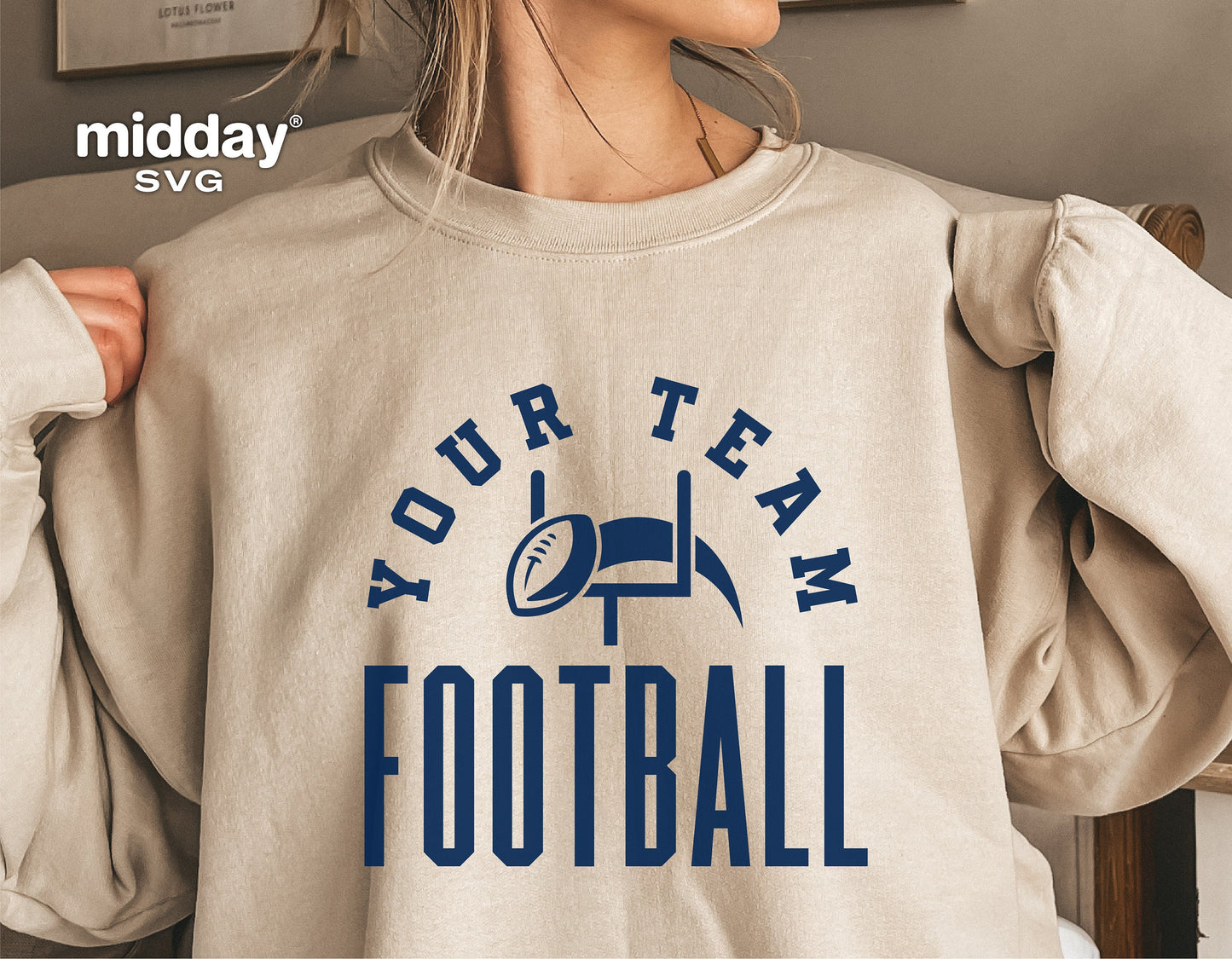 Person wearing beige sweater with 'Your Team Football' design, suitable for Cricut and Silhouette, ideal for making team shirts.