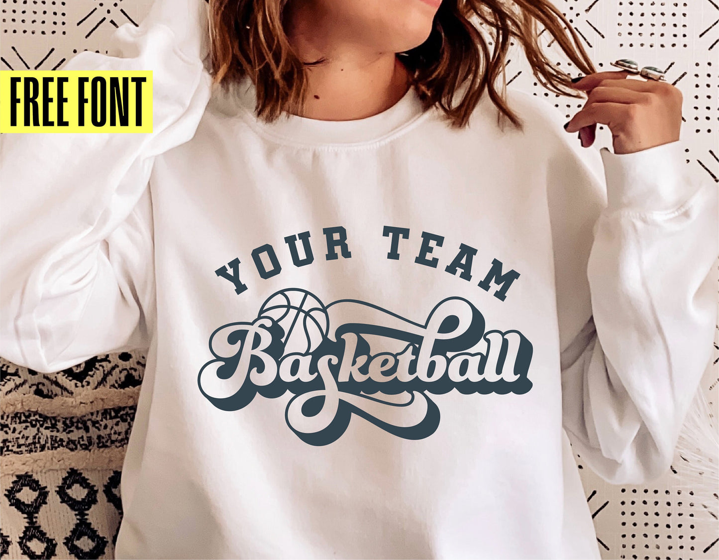 Person wearing a retro basketball team shirt design with 'Your Team Basketball' text and free font offer, suitable for Cricut and Silhouette.