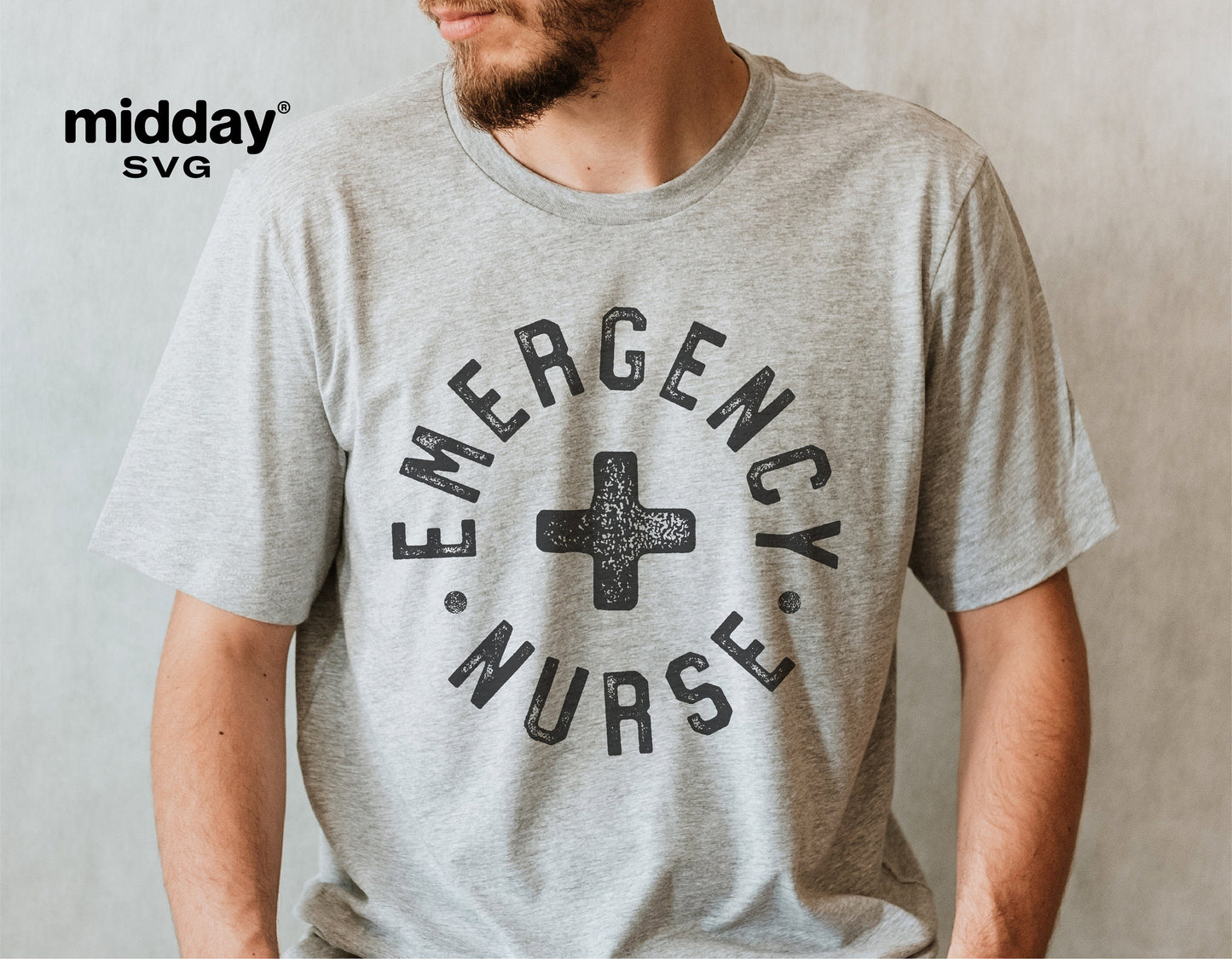 Gray shirt with 'Emergency Nurse' text and medical cross design, perfect for ER nurse apparel and Cricut cut file projects.