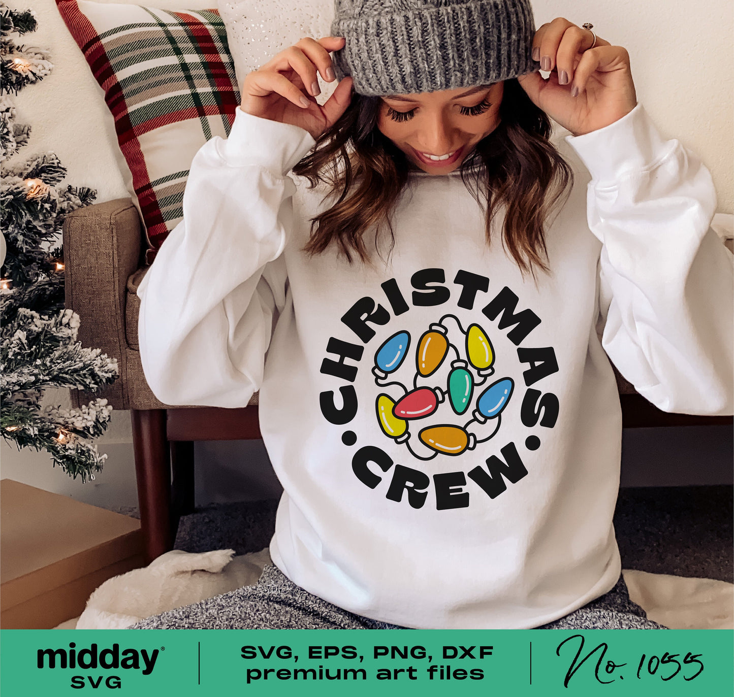 Woman wearing 'Christmas Crew' sweater with colorful lights design, seated next to holiday decor. Perfect for family Christmas shirts.