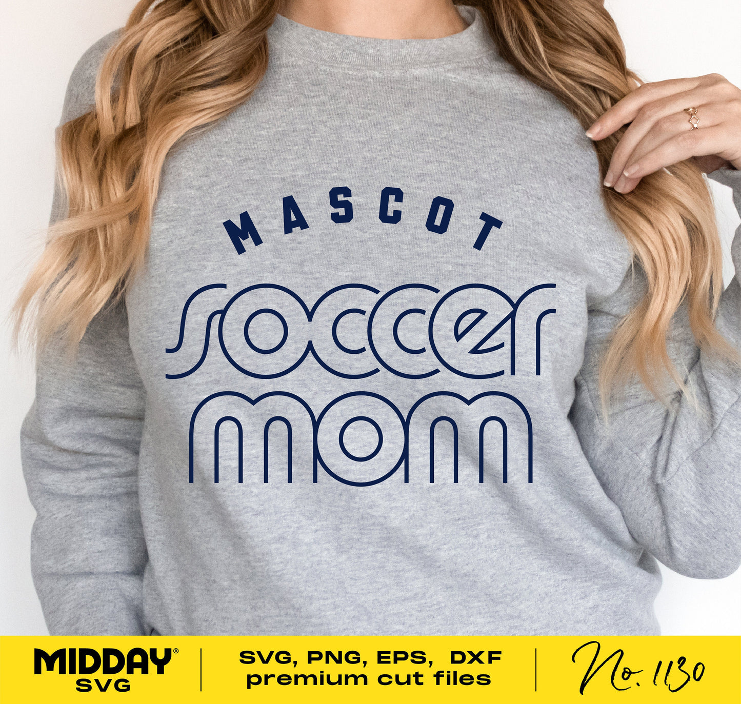 Woman wearing a gray sweatshirt with 'Soccer Mom' design for Cricut and Silhouette projects. Available in SVG, PNG, EPS, and DXF formats.