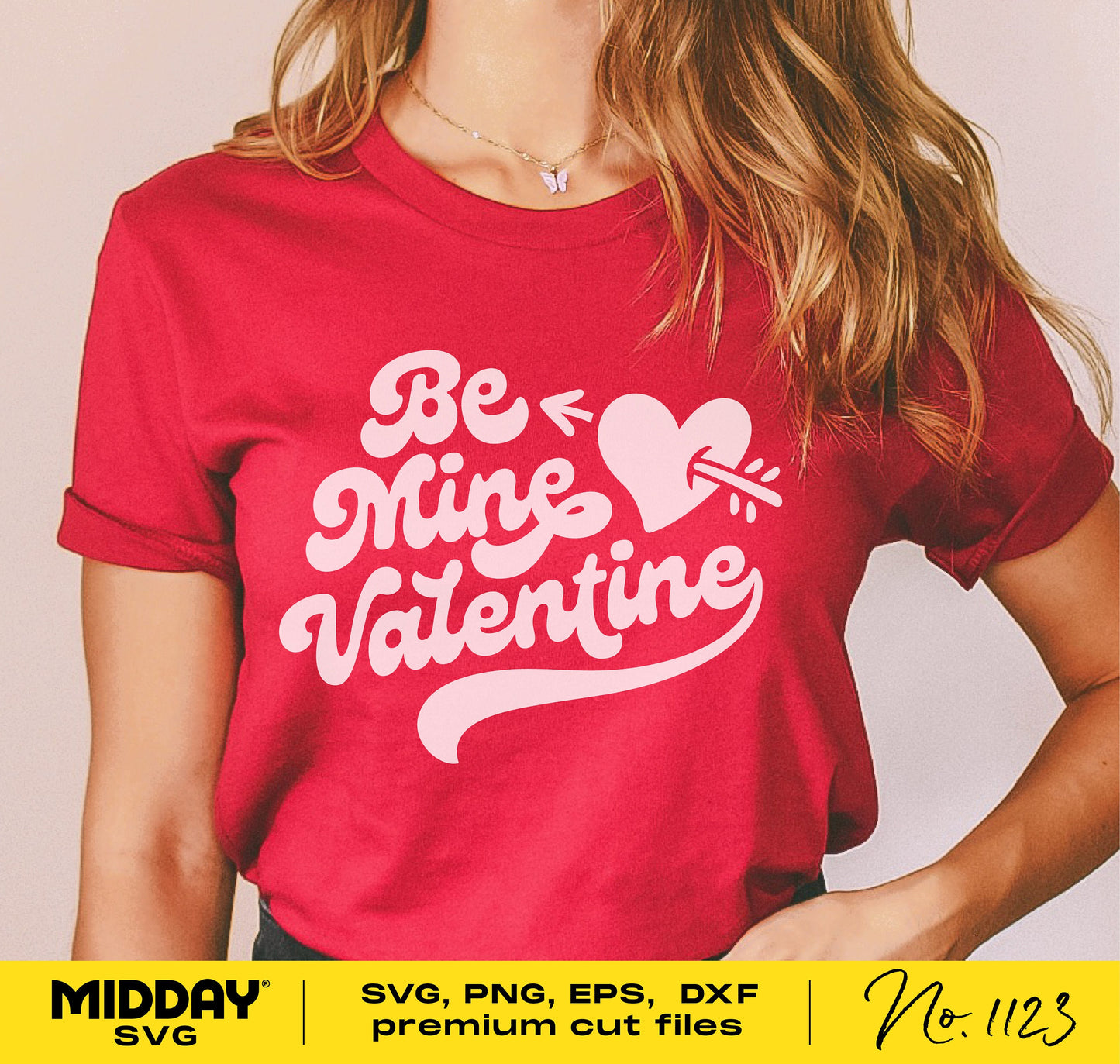 Red Valentine's Day shirt with 'Be Mine Valentine' text and heart with arrow design, suitable for Cricut and Silhouette crafting.