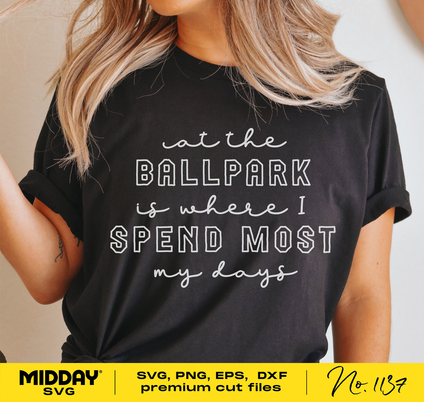 Woman wearing a 'At the Ballpark' shirt, ideal for baseball moms, available in SVG, PNG, EPS, DXF formats for Cricut and Silhouette.