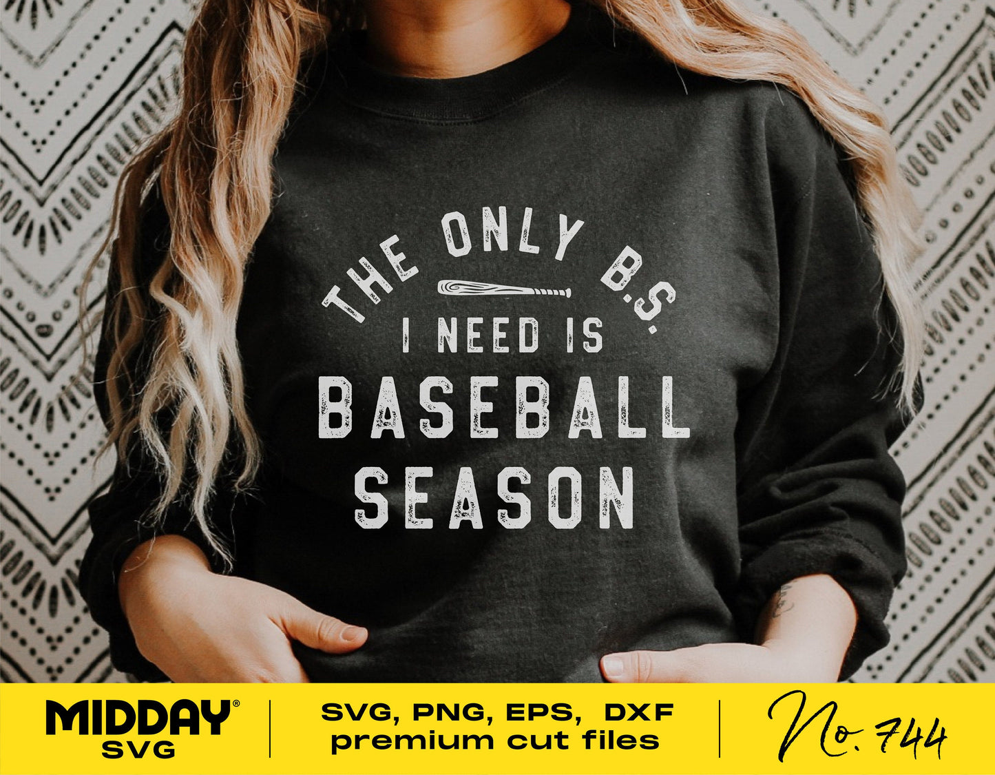 Woman wearing 'The Only B.S. I Need is Baseball Season' sweatshirt, showcasing baseball-themed SVG graphic for Cricut and Silhouette projects.