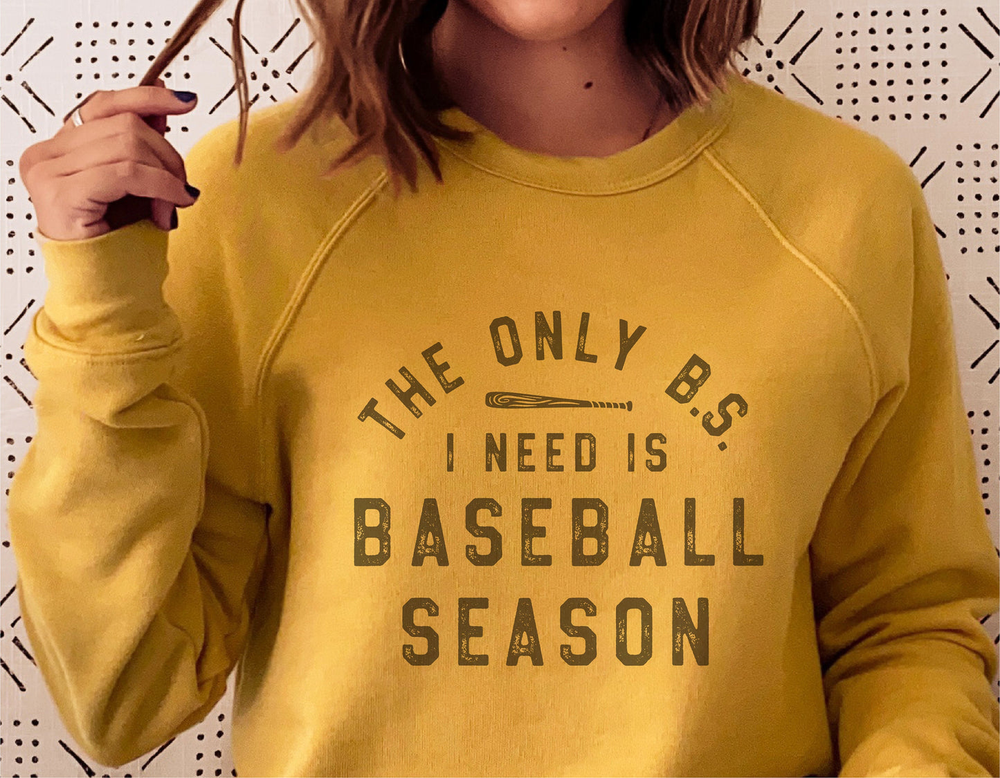 Yellow sweatshirt with 'The Only B.S. I Need is Baseball Season' design, ideal for baseball moms and fans, perfect Cricut cut file.
