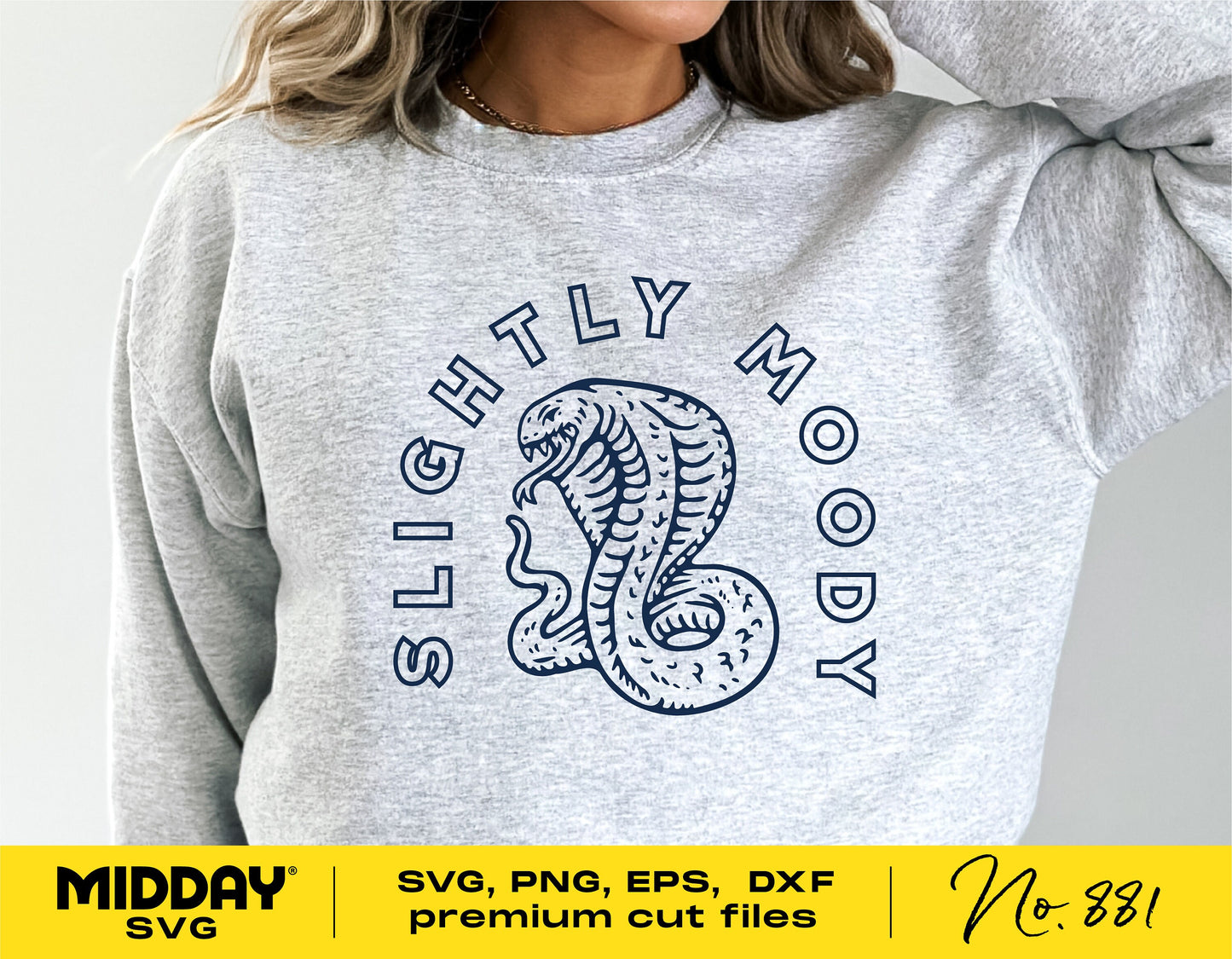 Woman wearing a gray sweater with 'Slightly Moody' sarcastic SVG design, featuring a snake graphic. Suitable for Cricut and Silhouette projects.