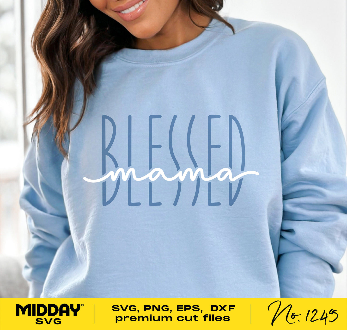 Woman wearing a "Blessed Mama" SVG design on a light blue sweatshirt, suitable for Cricut and laser cutting projects.