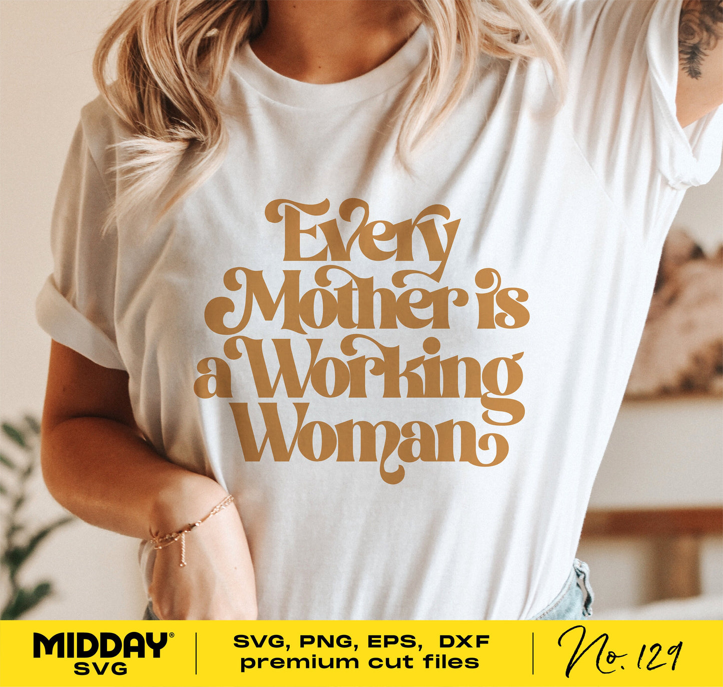 White t-shirt with "Every Mother is a Working Woman" in gold lettering, part of the Mom SVG Bundle for Cricut and crafting.