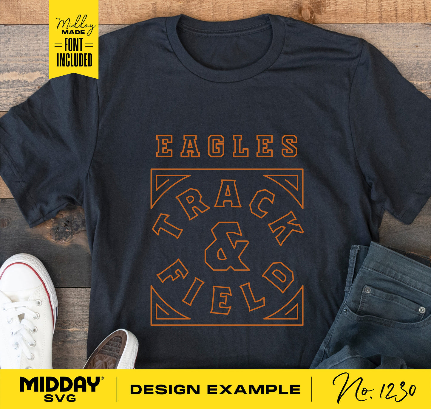 Black t-shirt with 'Eagles Track & Field' design in orange, laying on wooden surface near white sneakers and jeans. Midday SVG design example.