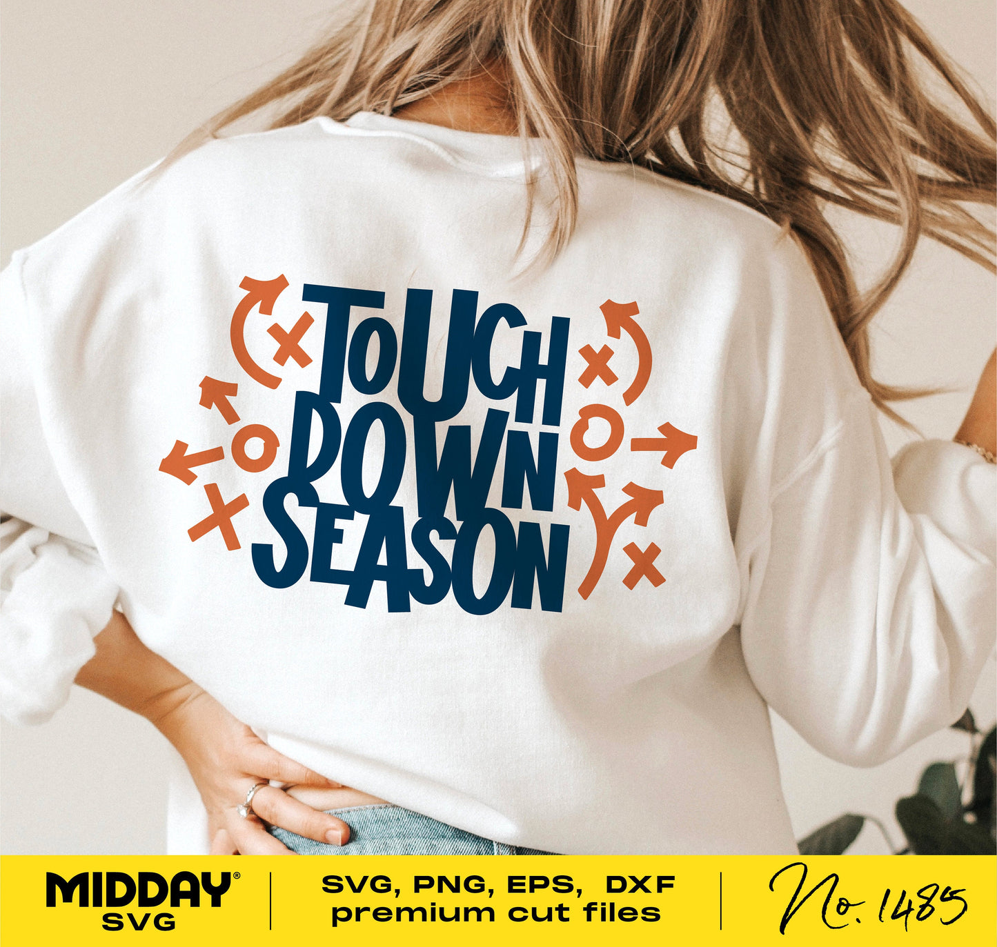Woman wearing sweatshirt with 'Touchdown Season' design, ideal for football-themed Cricut projects, available in SVG, PNG, EPS, DXF.