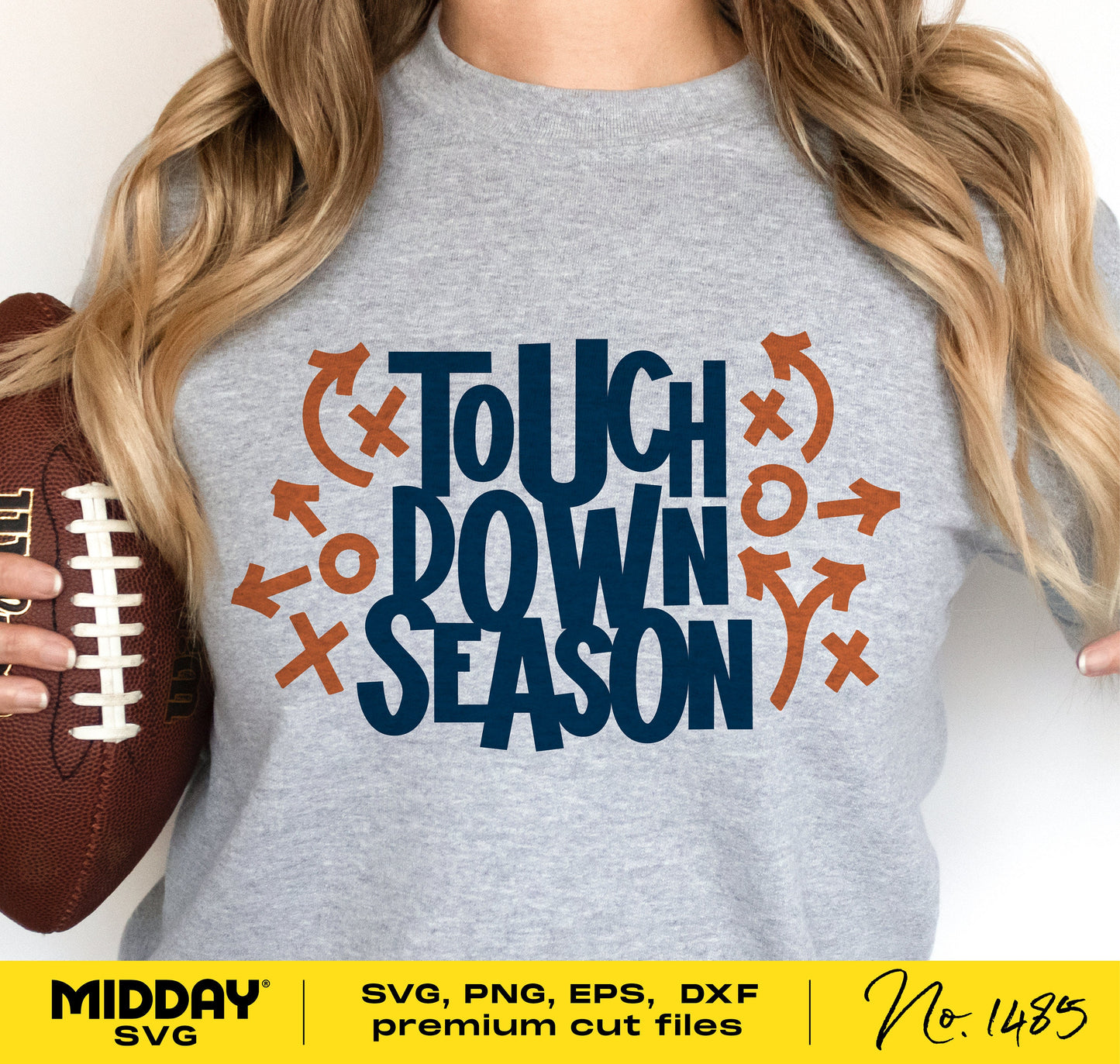 Woman wearing a grey t-shirt with 'Touchdown Season' SVG design, holding a football. Perfect for football moms and dads, Cricut projects.