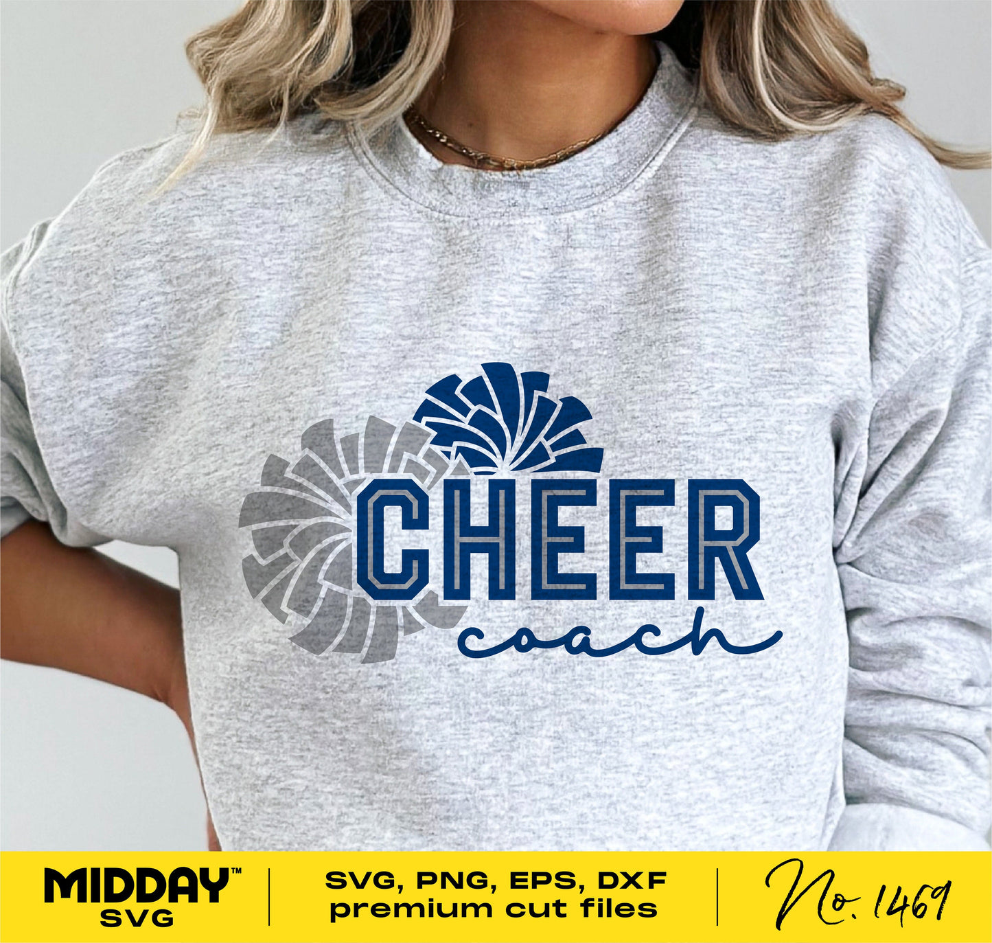 Woman wearing grey sweatshirt with 'Cheer Coach' design, featuring pom poms, for cheerleading enthusiasts or coaches.
