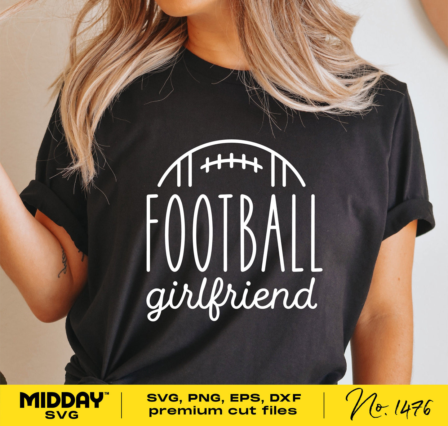 Woman wearing black t-shirt with 'Football Girlfriend' SVG design, perfect for creating sports-themed crafts and apparel.