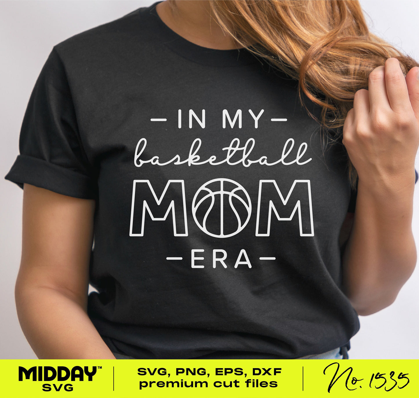 Woman wearing 'In My Basketball Mom Era' shirt; SVG, PNG designs for Cricut, Silhouette. Perfect for basketball moms.