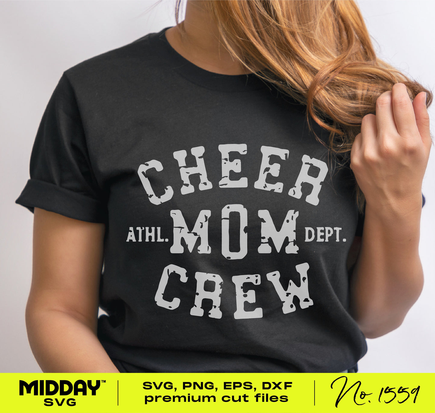 Woman wearing a black t-shirt with 'Cheer Mom Crew' graphic design in vintage font, suitable for Cricut and Silhouette projects.