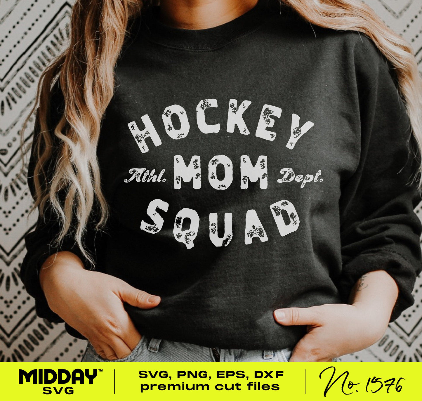 Woman wearing a black sweatshirt with 'Hockey Mom Squad' design in bold typography.