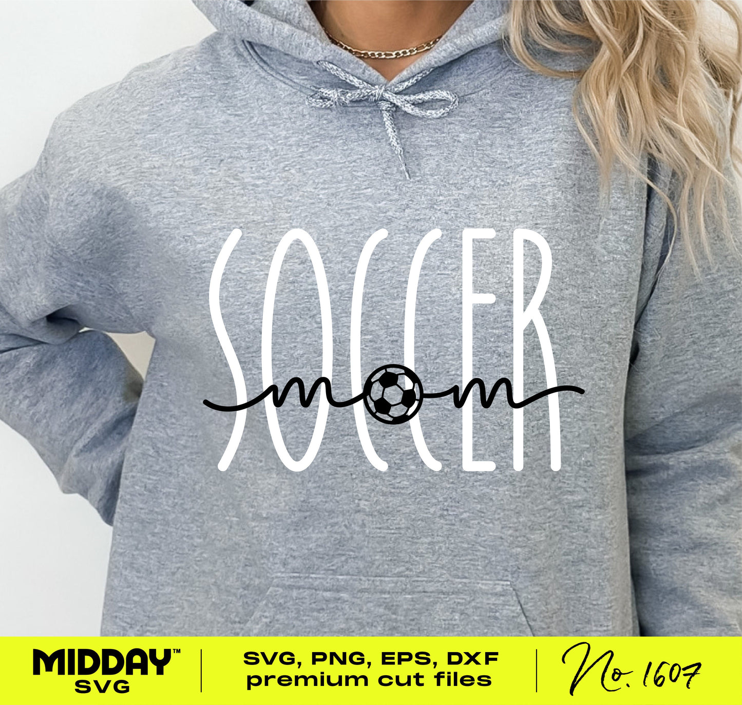 Woman wearing gray hoodie featuring cute soccer mom SVG design with playful lettering and soccer ball graphic, perfect for crafting.