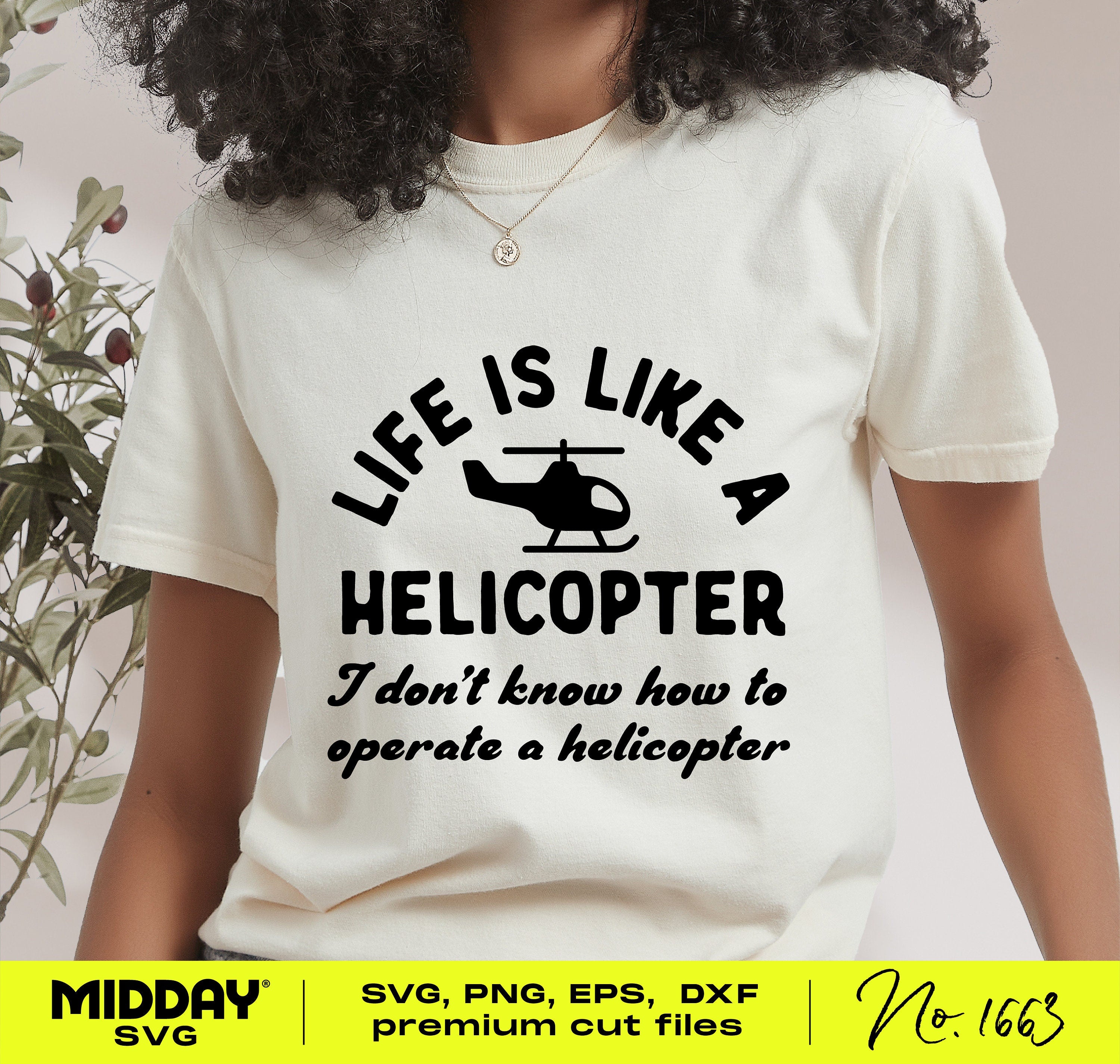 Person wearing a white shirt with 'Life is Like a Helicopter' funny quote, featuring a helicopter graphic, designed for SVG crafting.
