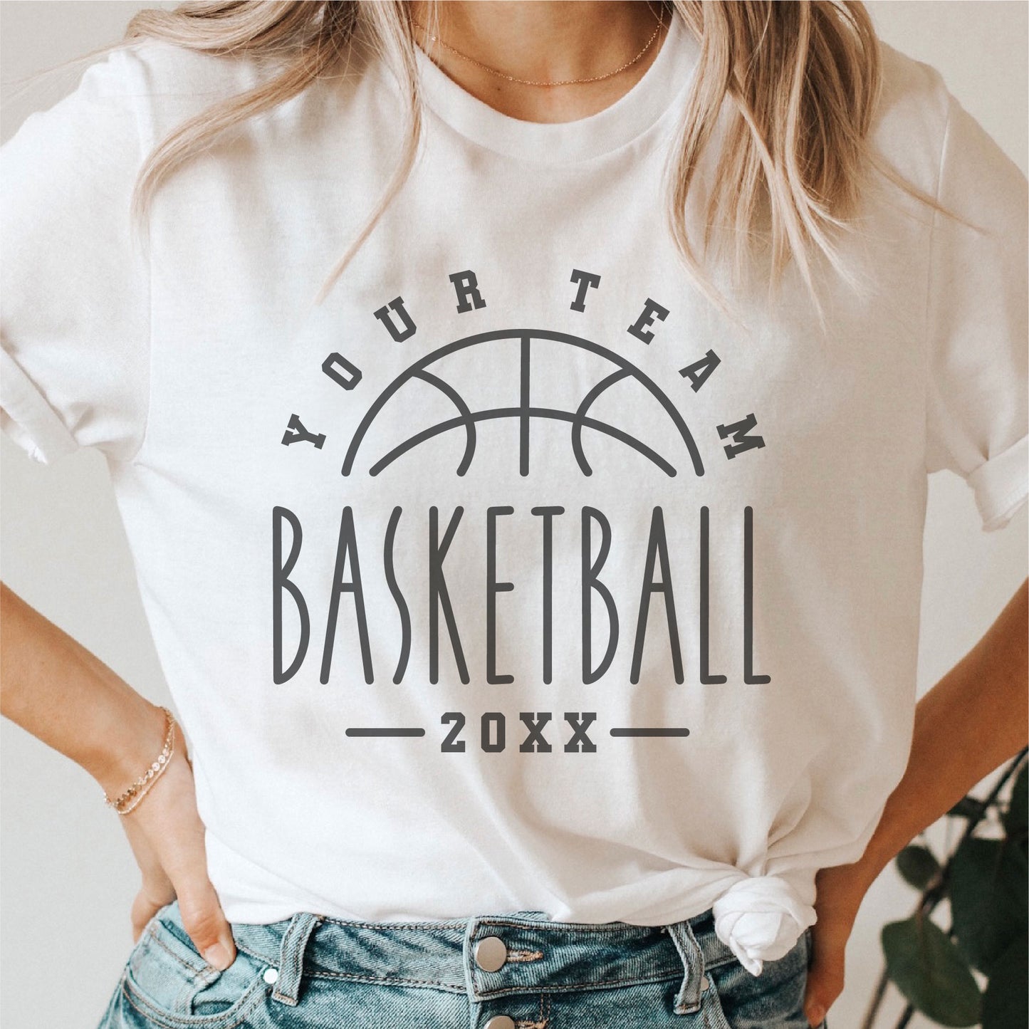 Woman wearing a white t-shirt with a customizable basketball team design template for shirts.