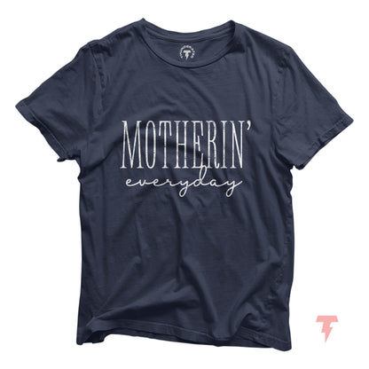 Navy blue funny mom shirt with 'Motherin' Everyday' slogan, perfect for casual wear or a baby shower gift, made of 100% cotton.