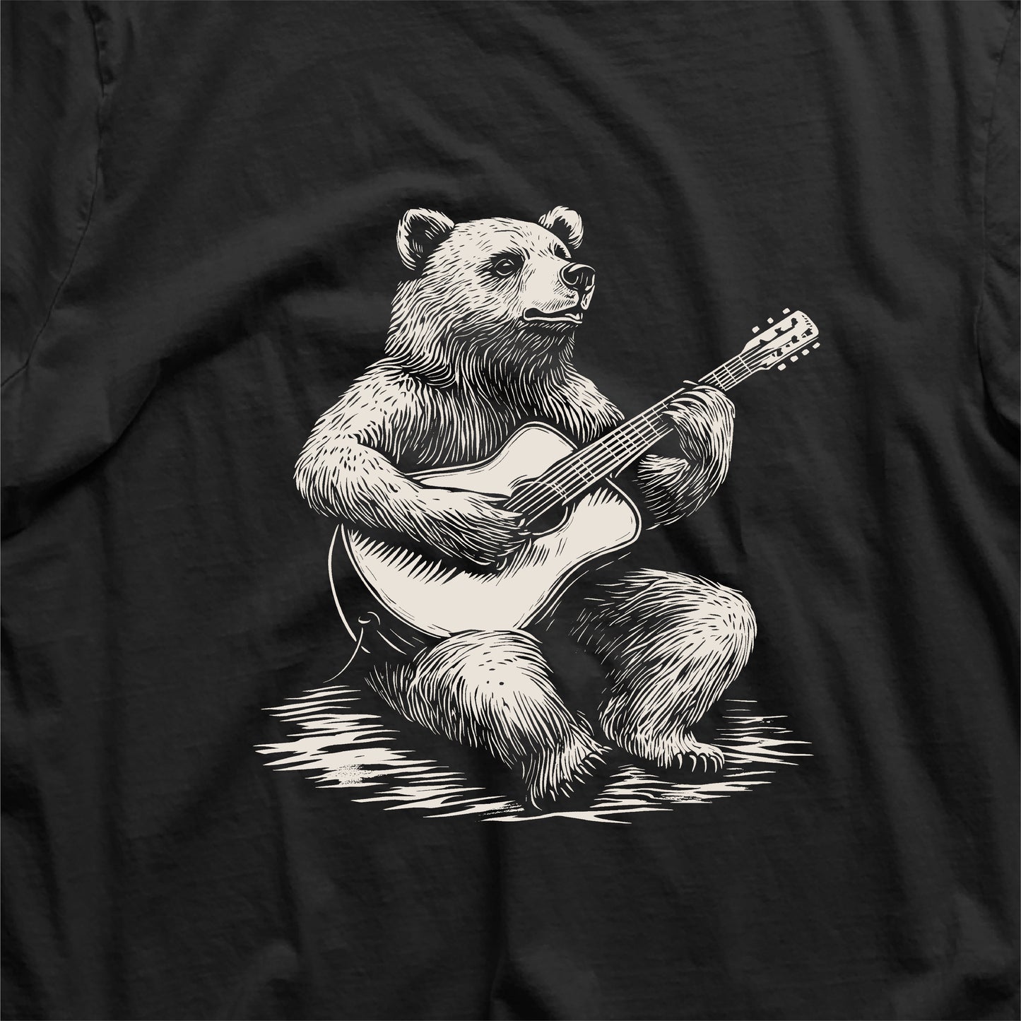 Graphic of a bear playing guitar printed on a musician-themed t-shirt, perfect gift for guitarists and music lovers.